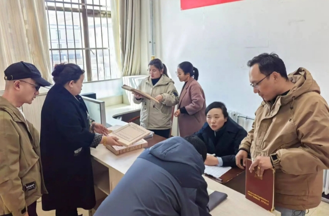 市档案局（馆）深入聂荣开展档案业务服务指导工作.png