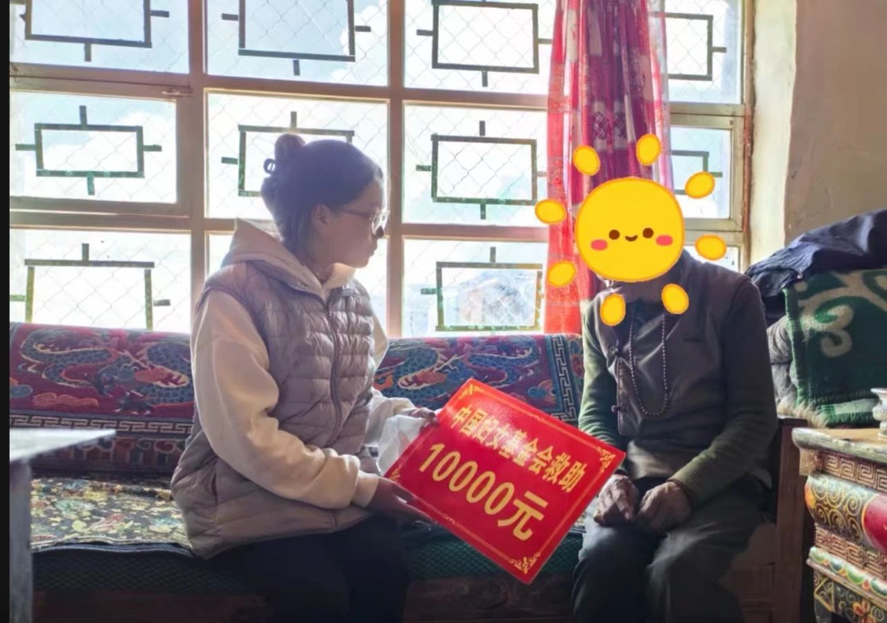 聂荣县妇联开展“两癌”救助金发放和慰问活动.jpg